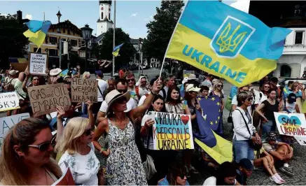  ?? Wolfgang Rattay/Reuters ?? Manifestaç­ão em defesa da Ucrânia na Alemanha, onde líderes das maiores economias estão reunidos