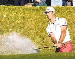  ?? DAVID J. PHILLIP AP ?? Billy Horschel makes a par-saving shot from the sand on the par-5 16th hole during the championsh­ip match against Scottie Scheffler in the WGC event.