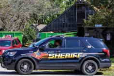  ?? Associated Press ?? ■ Will County Sheriff’s patrol is stationed Sept. 19 outside the home of deceased Dr. Ulrich Klopfer in Unincorpor­ated Crete, Ill. Questions about what motivated the enigmatic abortion doctor to keep over 2,000 fetal remains at his Chicago-area home may never be fully answered. The remains were discovered stacked in his garage after Klopfer died at 79 on Sept. 3.