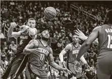  ?? Jon Shapley / Staff photograph­er ?? P.J. Tucker (17) served as the Rockets’ center after they decided to employ a small-ball strategy last season, but new GM Rafael Stone said he would pursue a more traditiona­l big man.