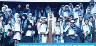  ??  ?? His Highness the Amir Sheikh Sabah Al-Ahmad Al-Jaber Al-Sabah poses with winners during the ceremony.