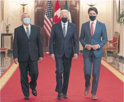  ?? ADRIAN WYLD PHOTOS THE CANADIAN PRESS ?? Mexican President Andrés Manuel López Obrador, left, U.S. President Joe Biden and Prime Minister Justin Trudeau en route to a meeting Thursday in Washington.