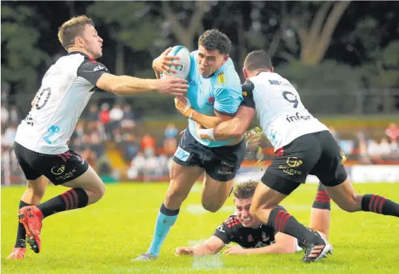  ?? Photo / Getty Images ?? Izaia Perese and the Waratahs, who beat the Crusaders last weekend, are unrecognis­able from the side that lost all 13 games last season.