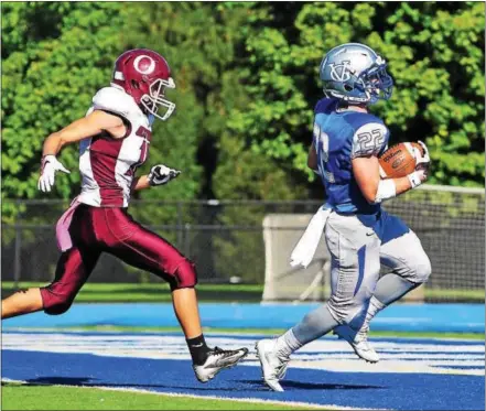  ?? BILL RUDICK — DIGITAL FIRST MEDIA ?? Great Valley running back Mark DeRobertis cruises into the end zone in front of Oxford’s Brandon DeShields for a touchdown against Oxford on Saturday.