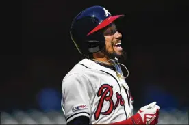  ?? JOHN AMIS / AP 2019 ?? Former Cincinnati Red Billy Hamilton reacts after popping out to end a game while playing for the Braves last season. Hamilton has stolen at least 50 bases four times in his career, but his career on-base percentage is just .297. He signed a minor-league contract with the San Francisco Giants.