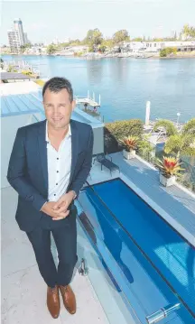  ?? Picture: MIKE BATTERHAM ?? Harcourts‘ Brent Martens at one of the most expensive rentals in the state, in Surfers Paradise.