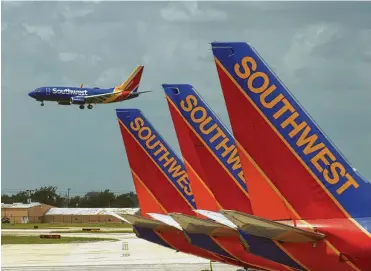 ?? Bill Montgomery / Houston Chronicle ?? The Dallas-based airline long known for marketing its low-cost “peanut fares” will discontinu­e offering its signature snack. Southwest will not prohibit passengers from bringing their own peanuts.