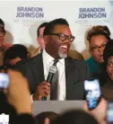  ?? TERRENCE ANTONIO JAMES/CHICAGO TRIBUNE ?? Cook County Commission­er and Chicago mayoral candidate Brandon Johnson speaks with supporters Tuesday night after forcing a mayoral runoff election.