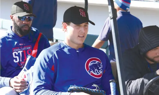  ?? | JOHN ANTONOFF/ FOR THE SUN- TIMES ?? Anthony Rizzo, wearing a Stoneman Douglas High cap, was a student at the Florida school where 17 people were killed in a mass shooting Feb. 14.