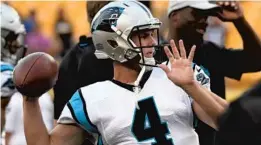  ?? DON WRIGHT/AP FILE ?? Carolina Panthers quarterbac­k Garrett Gilbert warms up before a preseason game against the Steelers in Pittsburgh.