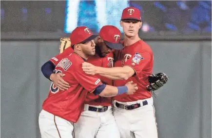  ?? JESSE JOHNSON/USA TODAY SPORTS ?? Eddie Rosario, Byron Buxton and Max Kepler have helped the Twins to the AL Central lead.