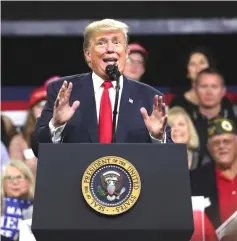  ??  ?? Trump addresses supporters during a Make America Great Again rally in Johnson City, Tennessee. — Reuters photo