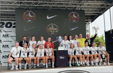  ?? COURTESY DAVE EHRBAR ?? The Cleveland Cobras 19-and-under girls soccer side celebrates with their NPL national title in Commerce City, Colo.