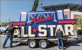  ?? JOHN SPINK/JOHN.SPINK@AJC.COM ?? Hey there, you’re an All-Star — well, not so fast, Georgia. Workers remove a sign touting Major League Baseball’s Midsummer Classic (and with it the millions of dollars it would bring to metro Atlanta) from Truist Park, home of the Braves, after MLB yanked the game to protest the state’s new voting law.