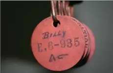  ??  ?? Billy wrote his name on tag E. 6-935.