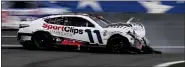  ?? MATT KELLEY — THE ASSOCIATED PRESS ?? Denny Hamlin (11) crashes on the front stretch during at Charlotte Motor Speedway, Monday, in Concord, N.C.