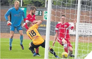  ??  ?? Stirling Abion’s Ross Kavanagh scores his side’s third at Forthbank.