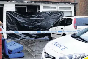  ??  ?? ●●The couple’s home in Birch Crescent, Newhey, was sealed off after Elizabeth’s body was found