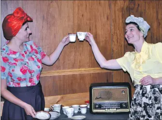  ??  ?? Elsie, right, played by Mary Gapinski and Dorothy (Louise Haggerty) toast the coronation with a cuppa.