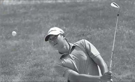  ?? GETTY IMAGES ?? Carl Yuan Yechun of China hits out of a bunker during the third round of the Portland Open on Pumpkin Ridge’s Witch Hollow course in North Plains, Oregon, on Aug 8 last year.