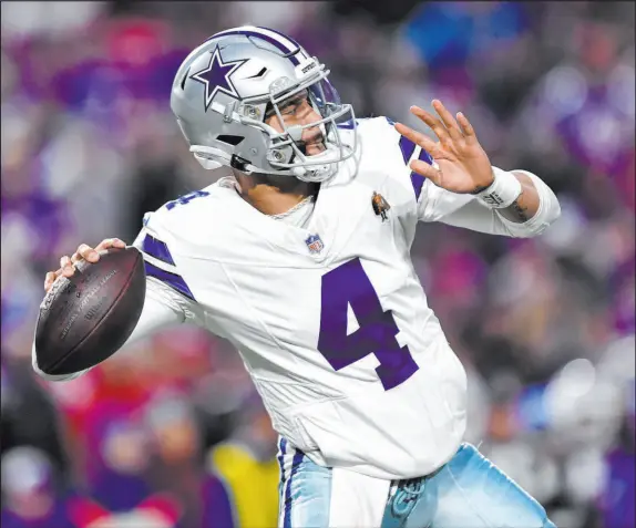  ?? Adrian Kraus The Associated Press ?? Dallas Cowboys quarterbac­k Dak Prescott led the NFL with 36 touchdown passes during the regular season.