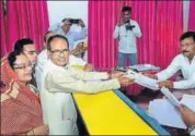  ?? PTI ?? Madhya Pradesh chief minister and BJP candidate Shivraj Singh Chouhan files his nomination paper for the upcoming Assembly elections, in Budhni on Monday.