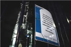  ??  ?? PARIS: A picture taken on December 15, 2016 shows a warning placard reading “A deratisati­on operation is taking place in the garden. To increase the efficiency, the square will remain stay close until the end of the interventi­ons” at the square of the...