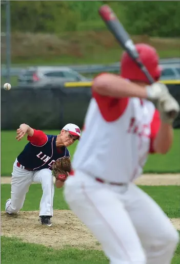 ?? Photo by Ernest A. Brown ?? Lincoln sophomore pitcher Corey Mayer (left) delivers a pitch early in Saturday afternoon’s 5-2 Division I defeat to Cranston West. Lincoln is now 5-8 heading into Tuesday night’s home contest against East Providence.