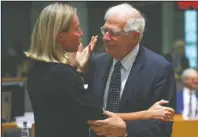  ?? The Associated Press ?? MEETING: European Union foreign policy chief Federica Mogherini, left, talks to Spain's Foreign Minister Josep Borrell during a European Foreign Affairs meeting at the European Council headquarte­rs in Brussels, Monday.