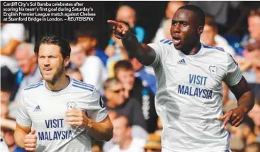  ??  ?? Cardiff City’s Sol Bamba celebrates after scoring his team’s first goal during Saturday’s English Premier League match against Chelsea at Stamford Bridge in London. – REUTERSPIX