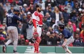  ?? NANCY LANE — BOSTON HERALD ?? Boston Red Sox catcher Connor Wong reacts after making a throwing error scoring two Tampa Bay Rays runs during the 6th inning of the game at Fenway Park in Boston Sunday.