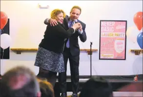  ?? Christian Abraham / Hearst Connecticu­t Media file photo ?? Mayor Joe Ganim hugs Bridgeport City Council President Aidee Nieves after addressing Ganim supporters at a fundraiser for his mayoral campaign.