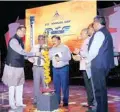  ??  ?? Lighting of the auspicious lamp by Jayant Sinha, Union Minister of State for Civil Aviation, during AAI’S 23rd Annual Day celebratio­n