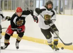  ?? CATHIE COWARD, THE HAMILTON SPECTATOR ?? Liam Van Loon, in white jersey, in action during Bulldogs’ Orientatio­n Camp scrimmage action at Morgan Firestone Arena Sunday.