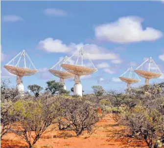  ?? HANDOUT VIA REUTERS ?? Radio telescopes are seen in Murchison, Western Australia, in this undated image. Powerful telescopes in Australia's outback have mapped vast areas of the universe in record-breaking time.