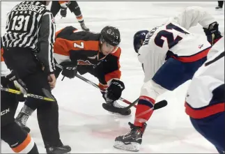  ?? NEWS PHOTO RYAN MCCRACKEN ?? Medicine Hat Tigers centre Mick Kohler takes a face off against Ryan Vandervlis of the Lethbridge Hurricanes during a Western Hockey League pre-season game at the Taber Civic Centre on Sept. 2.