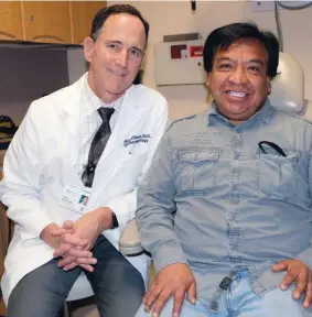  ??  ?? Dr. David Ellison, of Sutter’s Palo Alto Medical Foundation, with Jose, a patient who received treatment through the Operation Access program.