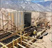  ?? Derek Armon Falcon Engineerin­g ?? CONSTRUCTI­ON continues on a headwall footing, which is part of the project along Highway 395.