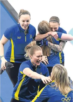  ??  ?? Olympic joy for Team Hasselborg as the Swedish team clinched gold in the women’s event.