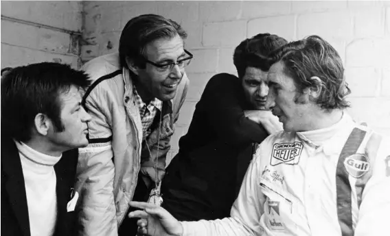  ??  ?? Above: Spa 1970, from left to right are Hans Mezger, Peter Falk, Fritz Spingler and Jo Siffert, who had just won the 1000km event in a Gulf 917 with Brian Redman