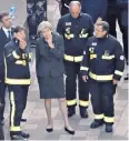  ??  ?? Ms Cotton speaks to Theresa May in the aftermath of the fire last year