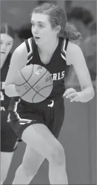  ?? Photo by Tique Hamilton ?? Roscoe’s Carson Greenwood is shown taking the ball down the court for the Plowgirls in Friday’s game with Colorado City. Greenwood finished with 12 points as Roscoe defeated the Lady Wolves for its 20th win.