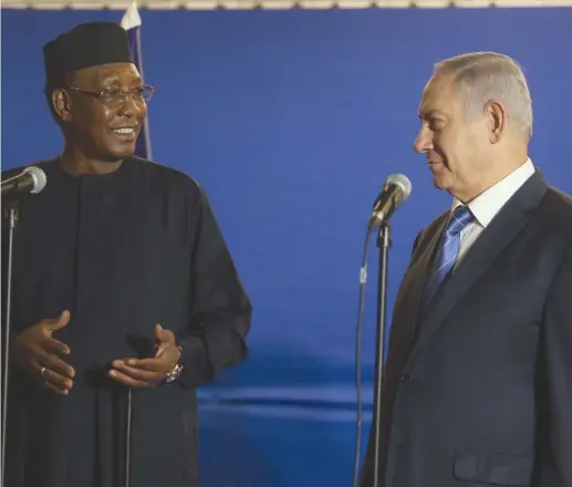  ?? (Marc Israel Sellem/The Jerusalem Post) ?? PRIME MINISTER Benjamin Netanyahu listens as Chadian President Idriss Deby speaks this week in Jerusalem. It’s time to invest more in the Foreign Ministry.