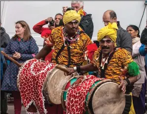  ??  ?? Performers at the Mela in Kelvingrov­e Park, taken byAnn McKelvie