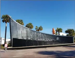  ?? PHOTOGRAPH­S BY SAMANTHA FEUSS/TNS ?? The John F. Kennedy Fountain at the entrance to the Kennedy Space Center.