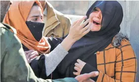  ?? OMAR SOBHANI/REUTERS ?? An Afghan woman cries at the site of a bomb blast after she heard her relative was among of the victims in Afghanista­n’s capital, Kabul, on December 15, 2020.