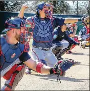  ?? CURTIS COMPTON / CCOMPTON@AJC.COM ?? The Braves got more productivi­ty at the plate from the catcher position with veterans Tyler Flowers (left) and Kurt Suzuki sharing duties.