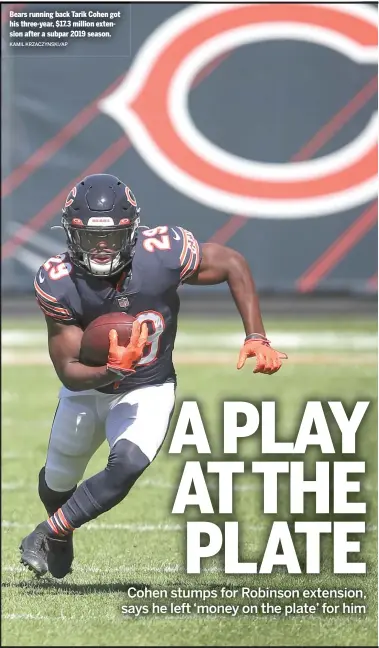  ?? KAMIL KRZACZYNSK­I/AP ?? Bears running back Tarik Cohen got his three-year, $17.3 million extension after a subpar 2019 season.