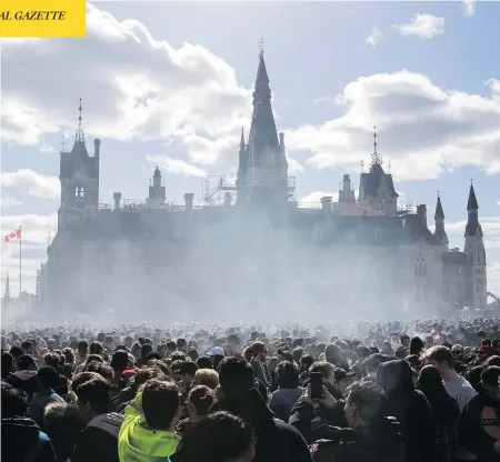  ?? LARS HAGBERG / AFP / GETTY IMAGES ?? A haze of smoke lingers over Parliament Hill at the annual pro-marijuana rally on April 20.