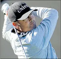 ?? AP/CHRIS CARLSON ?? Ryan Palmer holds the lead at the Farmers Insurance Open after shooting a 5-under-par 67 on Friday at Torrey Pines Golf Club in San Diego. He has a one shot lead over Jon Rahm and has a 10-shot lead over Tiger Woods, who made a PGA Tour cut for the...